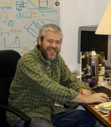 Happy graduate student, Tobias Landberg, in the lab
